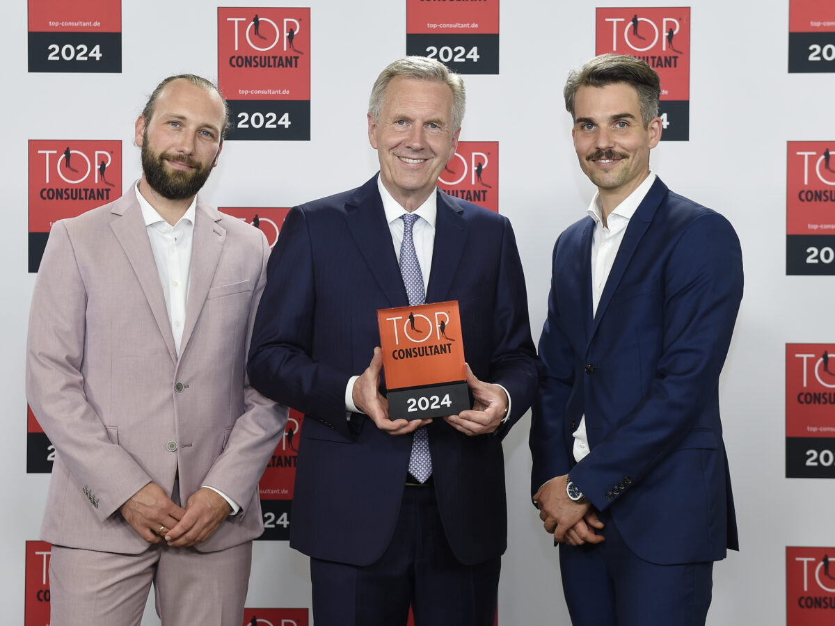 Verleihung Top Consultant: Joachim Stalph, Dr. Christian Wulff und Dr. Philipp Spreer